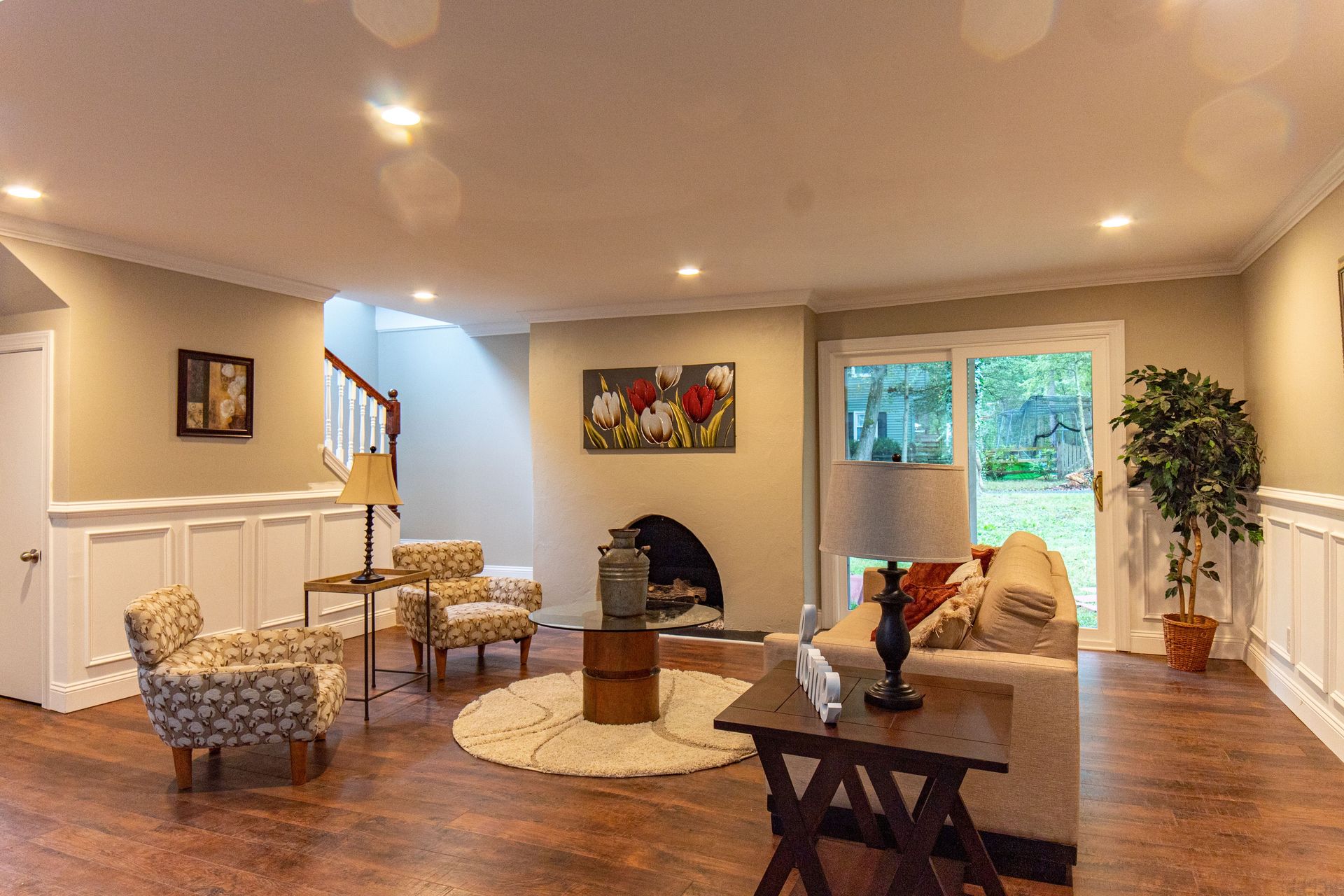 A stylish and cozy living room featuring elegant furniture and natural light.